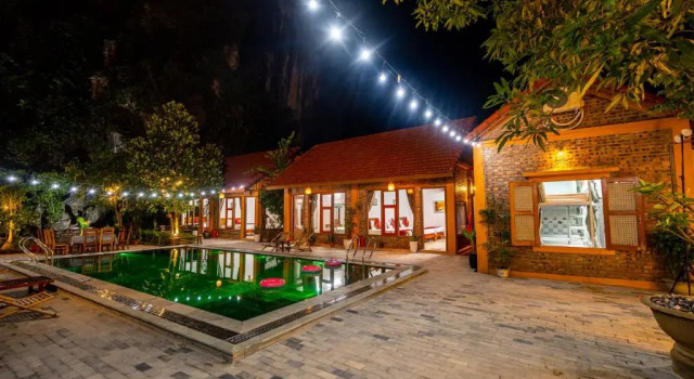Кровать в общем номере Tam Coc mountain bungalow