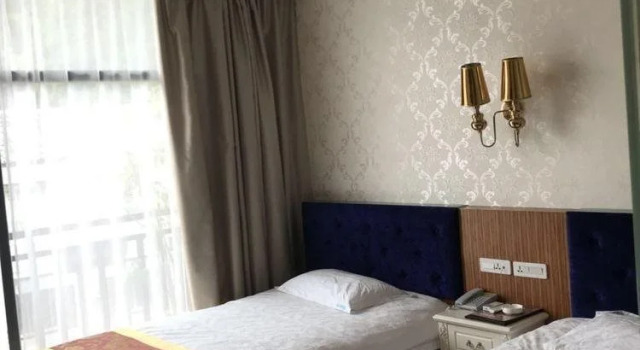 Qing Qing Hotel, Забронировать Отель Отели Яншо с парковкой, рядом с Парк Яншо, Парковка