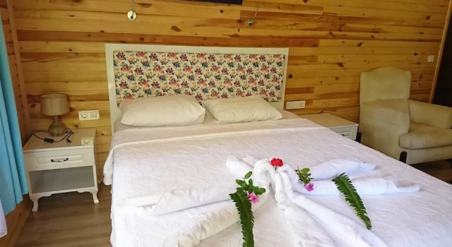 Бунгало Deluxe c 1 комнатой с балконом и с видом на сад Simge Pension