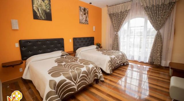 Четырёхместный номер Standard с балконом Hotel Posada Jatziri