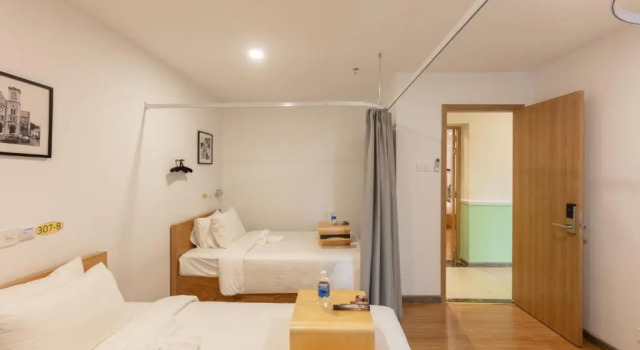 Кровать в общем номере Đại Nam SG Hotel