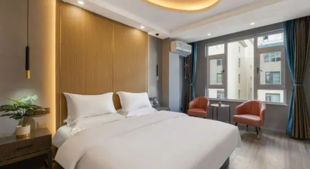 Люкс Business Jiaju Art Hotel (Qujing Railway Station Branch)