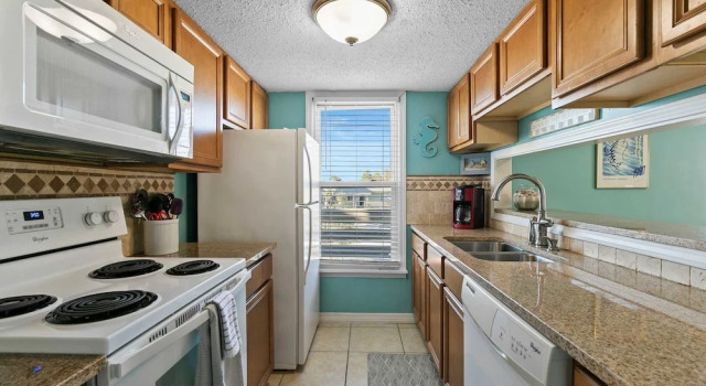 Spacious 2BR Condo With Pool Steps From the Beach