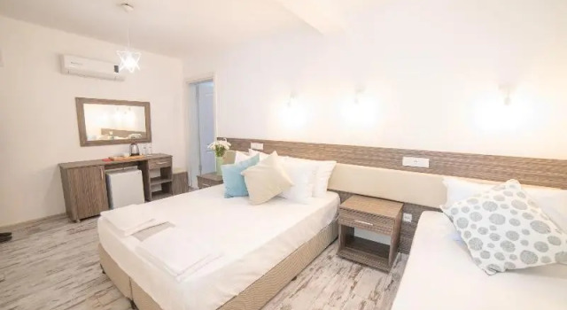 Трёхместный номер Standard c 1 комнатой Madda Hotel