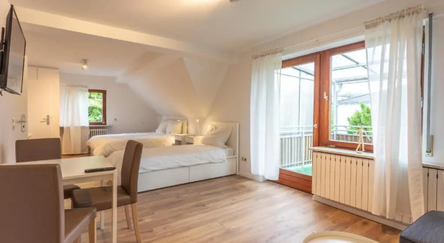 Кровать в общем номере city-house-bühl