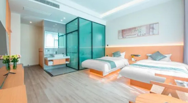 Кровать в общем номере Dali Yushan Heyue Homestay