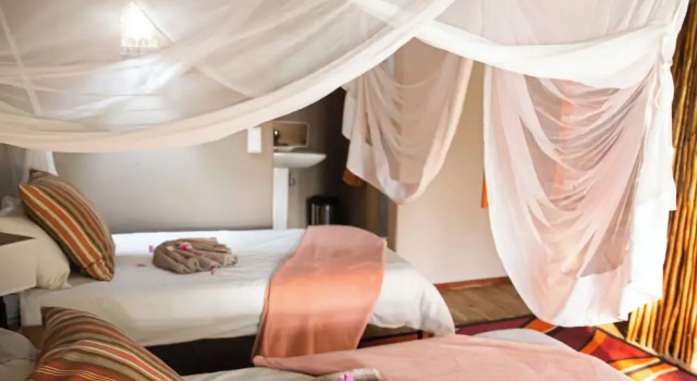 Kayova River Lodge, Buchen Sie Ferienhaus Ndiyona 