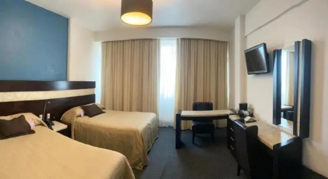 Четырёхместный номер Deluxe Hotel Real Rex