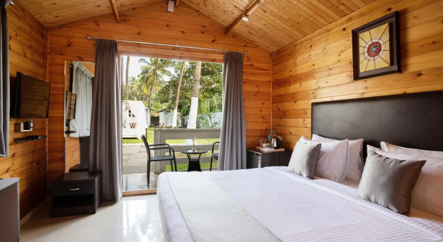 Коттедж Stone Wood Village Resort - Morjim Beach
