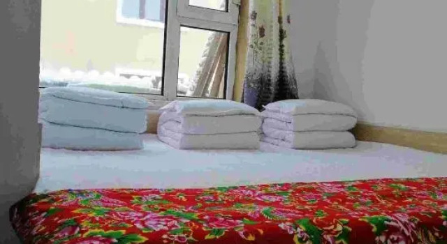 Xuexiang Zhaolaoer Family Hotel(雪乡赵老二家庭旅馆), Book Hotel Shuangfeng Forest Farm Kina
