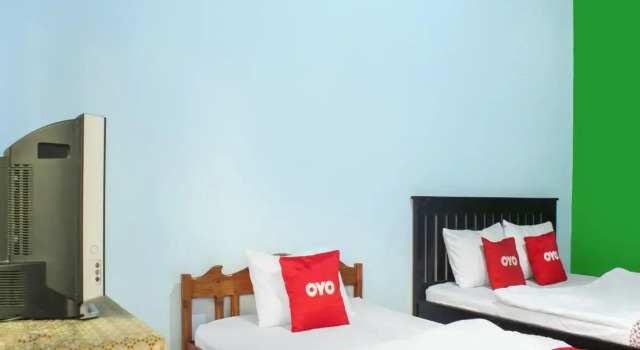 Трёхместный люкс Hotel O Wisma Harapan Baik
