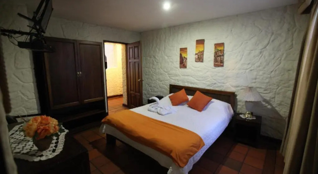 Номер Deluxe HOTEL Quito Antiguo