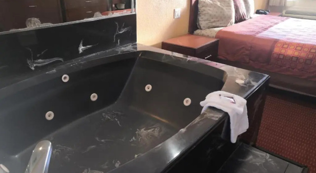 Одноместный номер Deluxe Scottish Inn & Suites