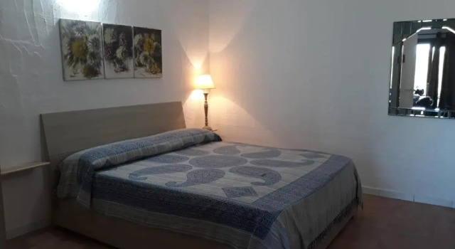 Студия Monolocale Arianna con giardino privato e piscina