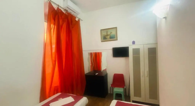 Кровать в общем номере Roman Place Affittacamere