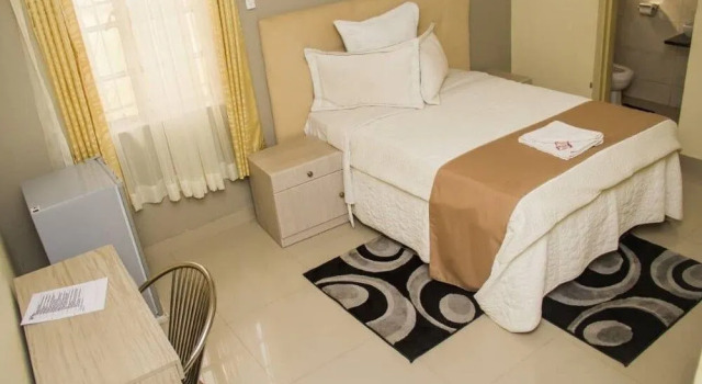 Nsanika Executive Lodge, Забронировать Дом для отпуска Коттеджи Ндола, Коттедж