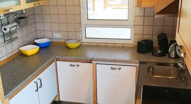 Кровать в общем номере Пентхаус с 6 комнатами Ferienhaus Event Haus EMG Hockenheim für Familien und Gruppen bis 22 Personen mit Partyraum