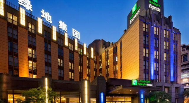 Кровать в общем номере Holiday Inn Express Shanghai Putuo by IHG