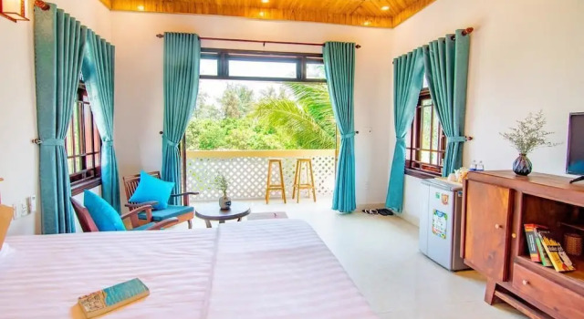 Номер Deluxe с балконом и с видом на море Vu Nhi Homestay