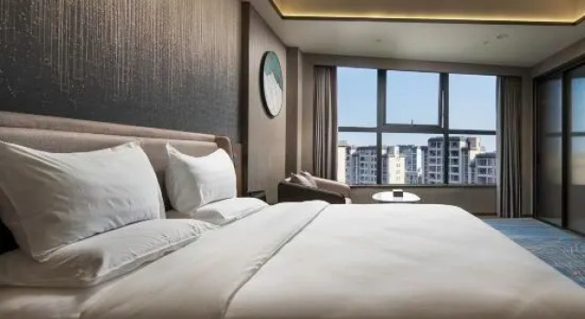 Люкс Deluxe Wanjia International Hotel Baoying Yangzhou (Wuyue Plaza)