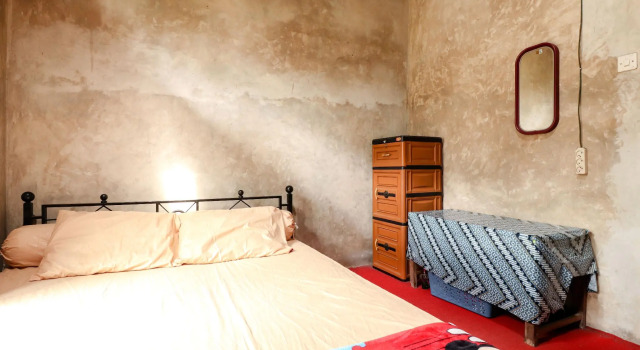 Bett im Wohnheim Kasmiyem Homestay