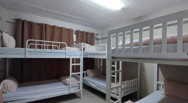 Кровать в общем номере Check-in ดอนเมือง ห้องพักรายวัน ปลอดบุหรี่ ใกล้สนามบินดอนเมือง เช็คอินดอนเมือง