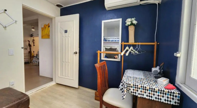 Cama en dormitorio compartido Aark House