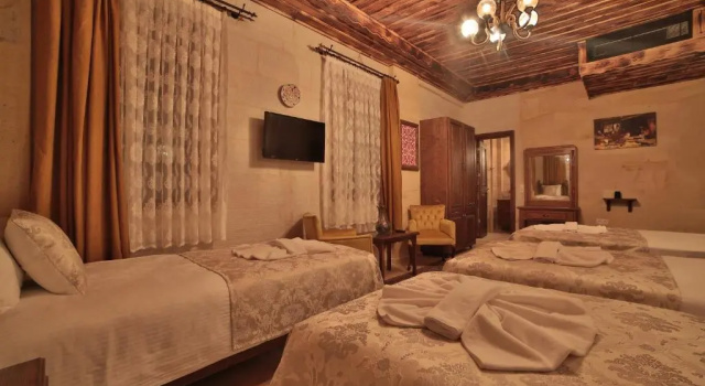 Четырёхместный номер Standard Caravanserai Inn Hotel