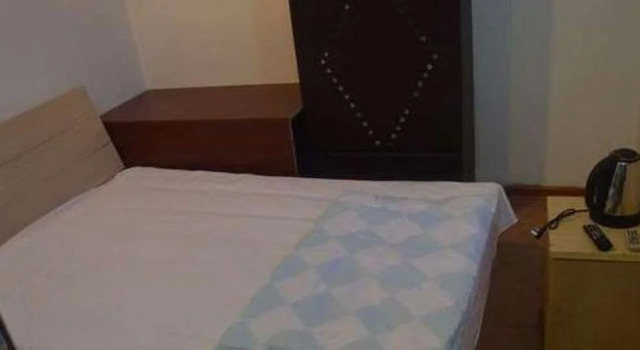 Qingdao Guanglongju Inn, Забронировать Отель Shibei District Циндао