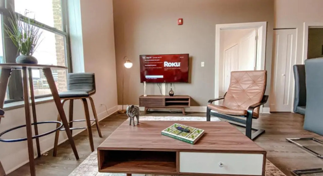 McCormick Place modern loft with an amazing city skyline view and optional parking for 6 guests