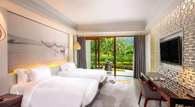 Grande quarto varanda e com vista para o jardim Angsana Lang Co