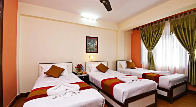 Кровать в общем номере The Hotel Pleasure Home Inn