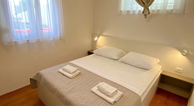 Семейные апартаменты Цокольный этаж с 2 комнатами с балконом Stipe Residence