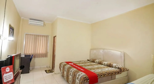 Nida Rooms 9 Kraton Tugu Railway Station at Hotel Queen Star