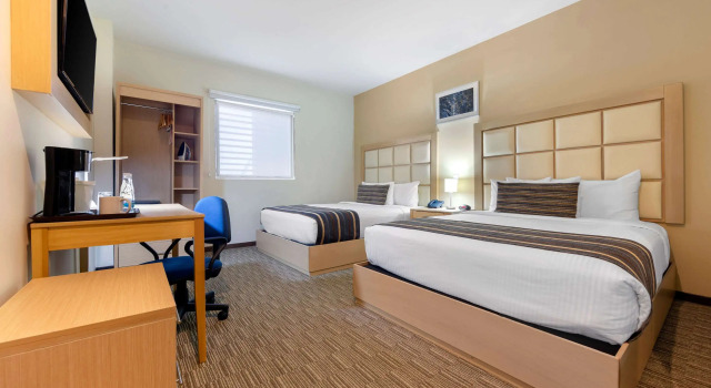 Четырёхместный номер Standard Sleep Inn Monterrey San Pedro