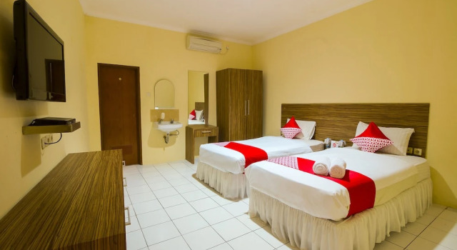 Habitación doble De lujo con balcón OYO 688 Grand Pakidulan Hotel