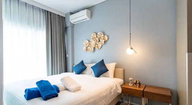 Апартаменты Luxury с 2 комнатами с балконом и с частичным видом на море Pattaya Holiday at Veranda Residence Pattaya