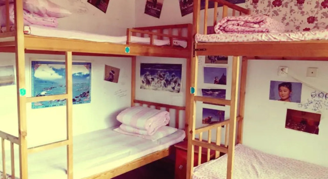 Кровать в общем номере Anda Guesthouse