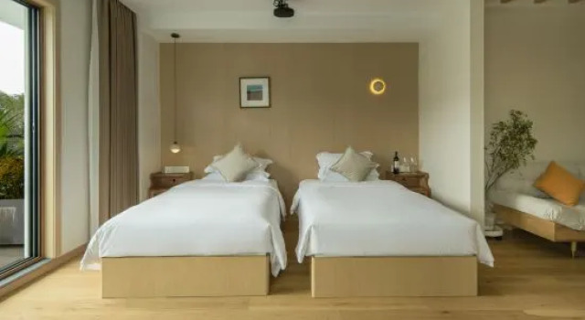 Кровать в общем номере Moganshan Qingxuan Designer Holiday Home