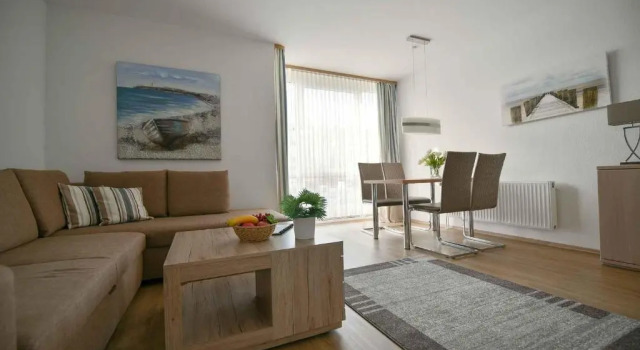 Апартаменты Ferienwohnung-47-mit-Schwimmbad-Sauna-Residenz-Passat-Doese