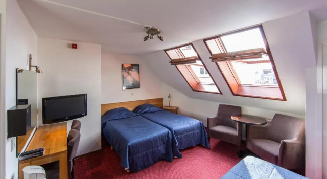 Четырёхместный номер Standard Amsterdam Wiechmann Hotel