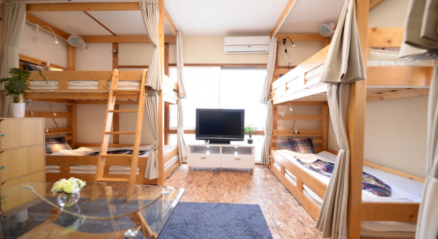 Кровать в общем номере Destiny Inn Sakaiminato