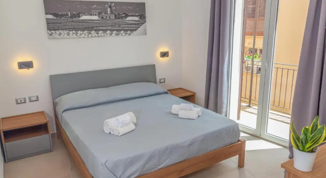 Standard Vierer Zimmer mit Balkon Isgrò Rooms