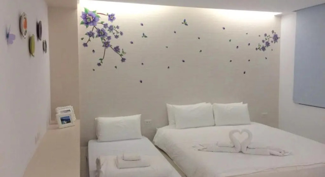 Трёхместный номер Deluxe Happiness . danshui