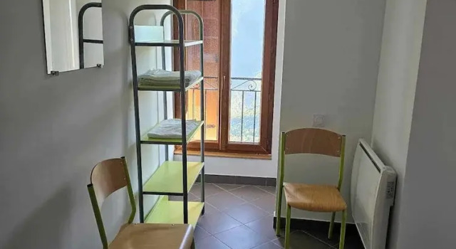 Кровать в общем номере l'Auberge La Gruppio
