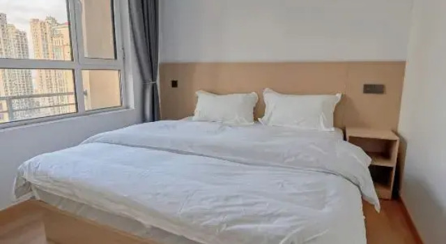 Люкс с 2 комнатами с видом на море Deep Blue 1996 Seaview Apartment (Qingdao Golden Beach Branch)