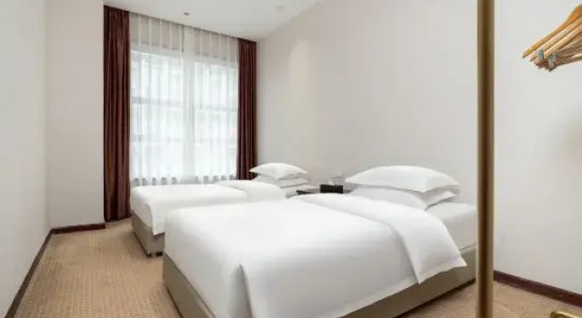 Семейный люкс Executive Dazhou Huayang Hotel (City Center Plaza Branch)