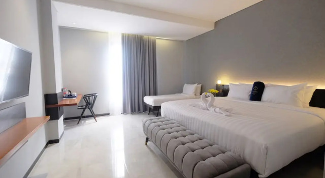 Habitación triple De lujo Hotel Youstay Semarang by Sinergi
