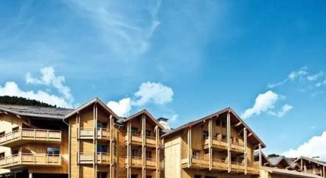 Кровать в общем номере Anova Hotel & Spa