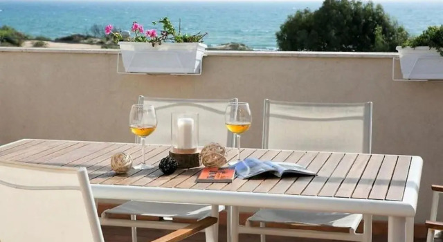 Апартаменты Attico Vista Mare e Piscina